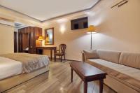 Postel nebo postele na pokoji v ubytování Palazetto Suites Zakynthos - Adults Only