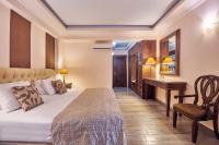 Postel nebo postele na pokoji v ubytování Palazetto Suites Zakynthos - Adults Only