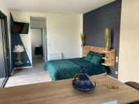 Część wypoczynkowa w obiekcie Adorable Studio d'hôte zen et paisible