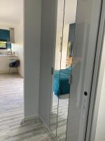 Łóżko lub łóżka w pokoju w obiekcie Adorable Studio d'hôte zen et paisible