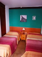 Postel nebo postele na pokoji v ubytování Corrala de San Antón. Sencillo apartamento en pleno centro
