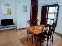 TV a/nebo společenská místnost v ubytování Corrala de San Antón. Sencillo apartamento en pleno centro