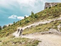two people riding bikes on a dirt trail on a hill at Appartement Serre Chevalier, 1 pièce, 4 personnes - FR-1-330F-119 in Serre Chevalier