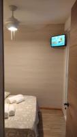 Postel nebo postele na pokoji v ubytování Benidorm Center Puerto Poniente 0