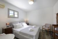 Posteľ alebo postele v izbe v ubytovaní Villa Rinia - seaview villa