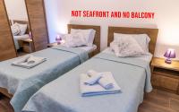 Posteľ alebo postele v izbe v ubytovaní Villa Umag Seafront