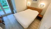 Posteľ alebo postele v izbe v ubytovaní 6-person apartment with swimming pool tennis court and free parking 25