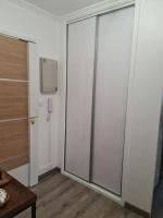 Televízia a/alebo spoločenská miestnosť v ubytovaní LE COCON DE JADE, LA MER A PERTE DE VUE