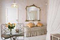 A bed or beds in a room at Dimore Santagaeta