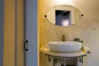 A bathroom at Dimore Santagaeta