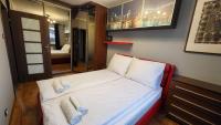 Łóżko lub łóżka w pokoju w obiekcie Apartament Skarbka