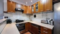 Kuchnia lub aneks kuchenny w obiekcie Apartament Skarbka