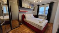 Łóżko lub łóżka w pokoju w obiekcie Apartament Skarbka