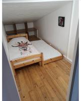 Posteľ alebo postele v izbe v ubytovaní Maison 2 chambres, terrasse, proche de la plage N'2