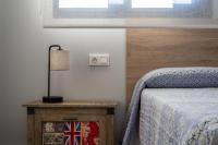 A bed or beds in a room at Apartamento Estepona I