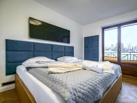Posteľ alebo postele v izbe v ubytovaní VisitZakopane- Sekwoja Apartment