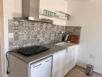 A kitchen or kitchenette at Appartement Villa Pasithea