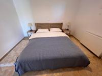 A bed or beds in a room at Appartement Villa Pasithea