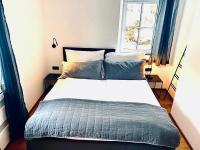 A bed or beds in a room at Chalet Badberg