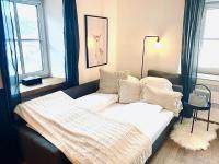 A bed or beds in a room at Chalet Badberg
