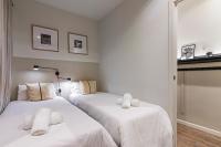 Posteľ alebo postele v izbe v ubytovaní Habitat Apartments Sweet Sagrada Familia