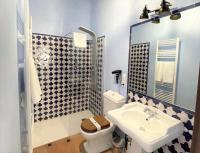 Kúpeľňa v ubytovaní SUITES CASA DE LAS COLUMNAS
