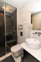 A bathroom at Gran Capital Top Central Apartment