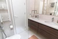 A bathroom at Gran Capital Top Central Apartment