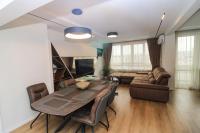 A seating area at Gran Capital Top Central Apartment