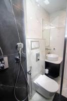 A bathroom at Gran Capital Top Central Apartment