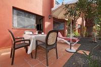 Patio lub wspólna przestrzeń na świeżym powietrzu w obiekcie Oasis Tamarindo sport e relax
