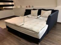 Łóżko lub łóżka w pokoju w obiekcie Nuovo Casa