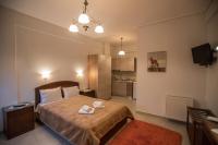 A bed or beds in a room at Nefeles