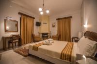 A bed or beds in a room at Nefeles