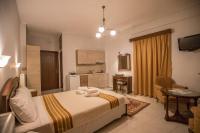 A bed or beds in a room at Nefeles