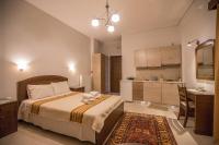 A bed or beds in a room at Nefeles