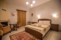 A bed or beds in a room at Nefeles