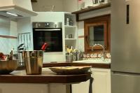 A kitchen or kitchenette at Classical corner town house in historical centre