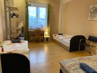 Posteľ alebo postele v izbe v ubytovaní Hermina apartmanház