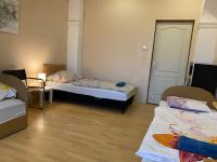 Posteľ alebo postele v izbe v ubytovaní Hermina apartmanház