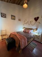 Postel nebo postele na pokoji v ubytování La Casita de Charo 1