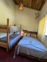 Postel nebo postele na pokoji v ubytování La Casita de Charo 1