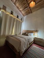 Postel nebo postele na pokoji v ubytování La Casita de Charo 1