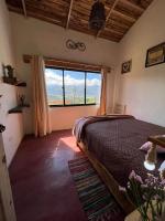 Postel nebo postele na pokoji v ubytování La Casita de Charo 1