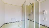 A bathroom at Miriam Hotel & Residence