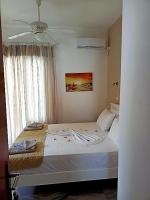 Posteľ alebo postele v izbe v ubytovaní Marisa Rooms