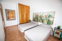 Postel nebo postele na pokoji v ubytování Villa Zoad