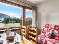 a room with a table and a chair and a window at Appartement Megève, 2 pièces, 4 personnes - FR-1-453-63 in Megève