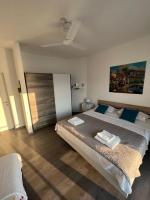 Posteľ alebo postele v izbe v ubytovaní Blue Art Apartment