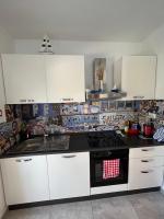 Kuchyňa alebo kuchynka v ubytovaní Blue Art Apartment